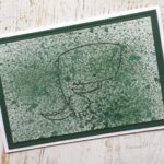 Dinosaur på grønlig splat baggrund